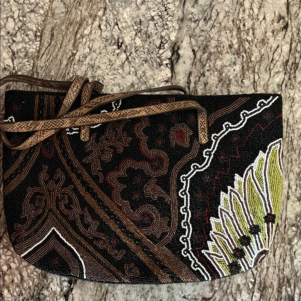 Elegant Black and Brown Clutch with Intricate Patterns